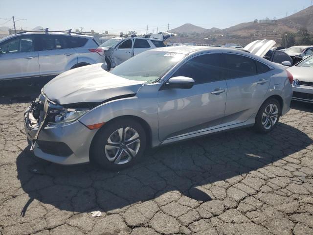 HONDA CIVIC LX 2018 with VIN 2HGFC2F55JH528518 - Photo from auction