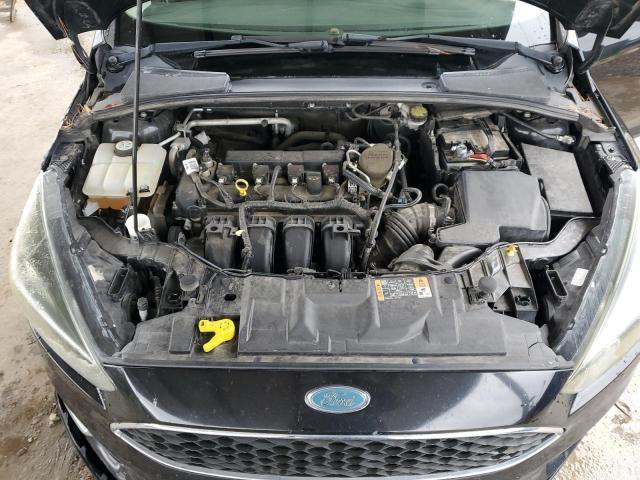 Photo 11 from auction – 2015 FORD FOCUS SE with VIN 1FADP3F21FL274845