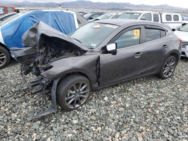 MAZDA 3 TOURING 2018 with VIN 3MZBN1L3XJM271858 - Photo from auction