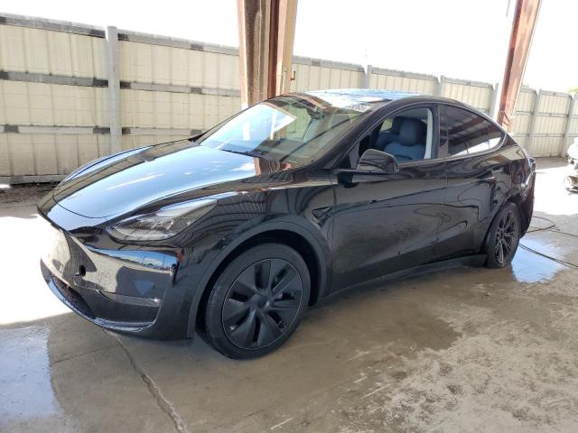 TESLA MODEL Y 2024 with VIN 7SAYGAEE2RF212375 - Photo from auction