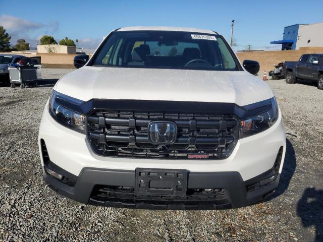 Photo 5 from auction – 2024 HONDA RIDGELINE with VIN 5FPYK3F12RB010095