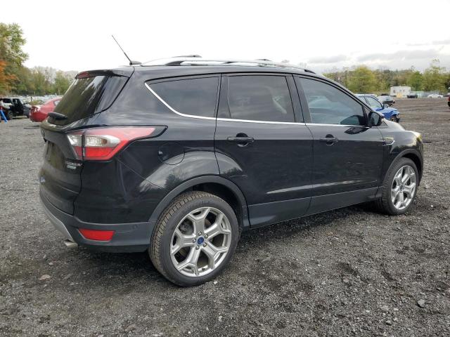 Photo 3 from auction – 2017 FORD ESCAPE TITANIUM with VIN 1FMCU0J90HUB64587
