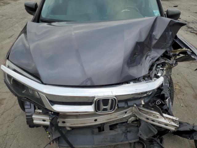 Photo 12 from auction – 2021 HONDA PILOT LX with VIN 5FNYF6H16MB011464