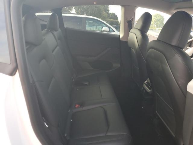 Photo 11 from auction – 2023 TESLA MODEL Y with VIN 7SAYGDEEXPA102184
