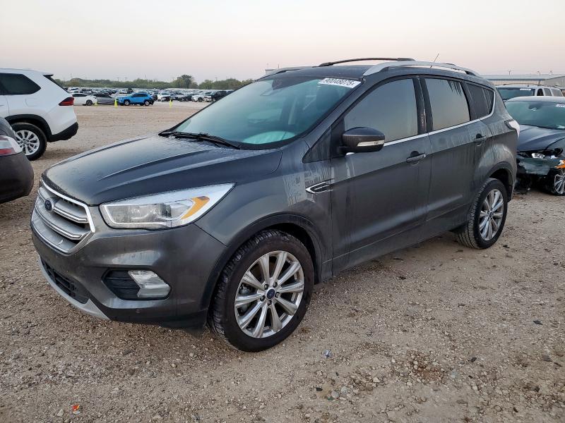 FORD ESCAPE TIT 2017 with VIN 1FMCU9J90HUB42710 - Photo from auction