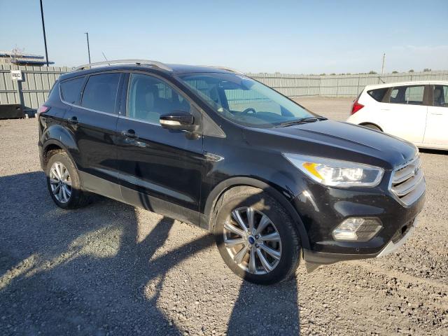 Photo 4 from auction – 2018 FORD ESCAPE TIT with VIN 1FMCU9J93JUC63897