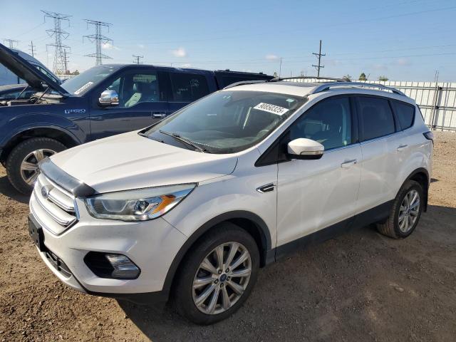 FORD ESCAPE TIT 2017 with VIN 1FMCU9JD8HUD03244 - Photo from auction