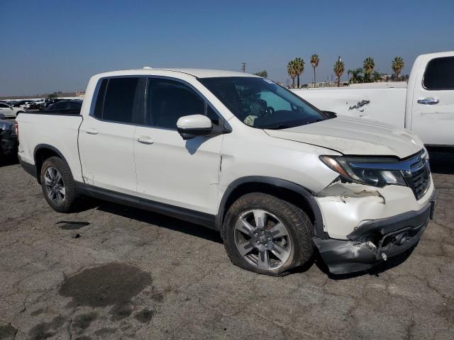 Photo 4 from auction – 2017 HONDA RIDGELINE with VIN 5FPYK2F60HB010052