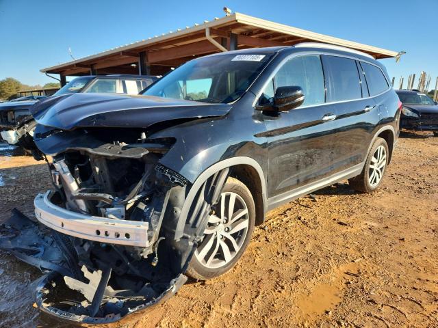 Photo 1 from auction – 2017 HONDA PILOT TOUR with VIN 5FNYF6H94HB064806