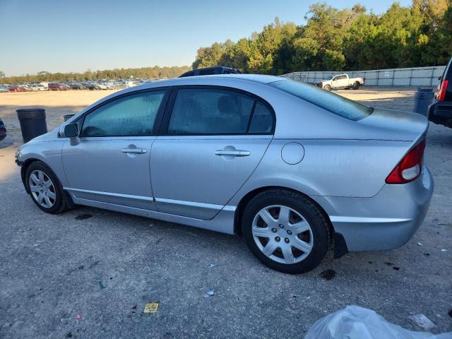 Photo 2 from auction – 2011 HONDA CIVIC LX with VIN 19XFA1F53BE034587