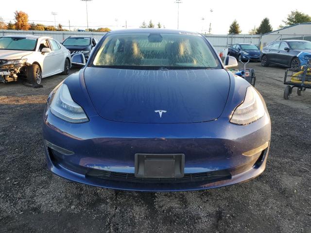 Photo 5 from auction – 2018 TESLA MODEL 3 with VIN 5YJ3E1EB3JF150962