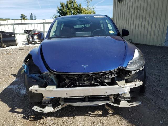 Photo 5 from auction – 2023 TESLA MODEL Y with VIN 7SAYGDEF1PF600317