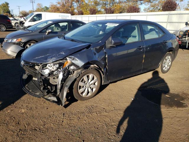 TOYOTA COROLLA L 2015 with VIN 2T1BURHE1FC414212 - Photo from auction