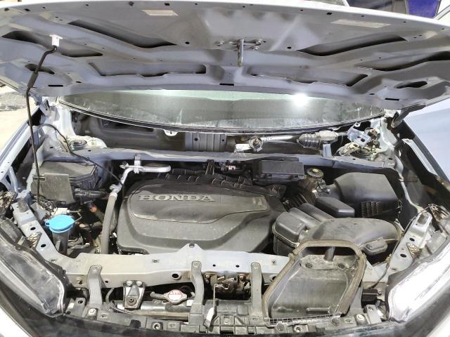 Photo 12 from auction – 2022 HONDA PILOT BLAC with VIN 5FNYF6H71NB062750