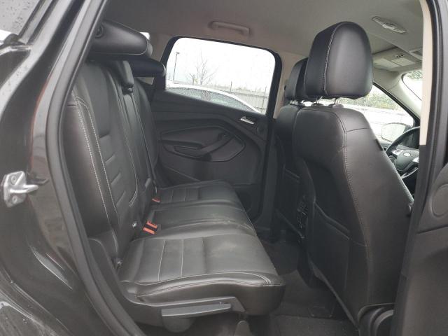 Photo 10 from auction – 2014 FORD ESCAPE TITANIUM with VIN 1FMCU9J97EUC65769