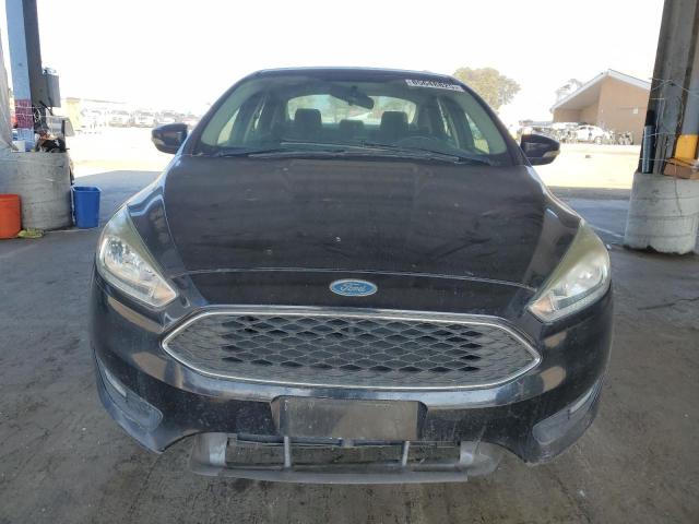 Photo 5 from auction – 2015 FORD FOCUS SE with VIN 1FADP3F27FL211278