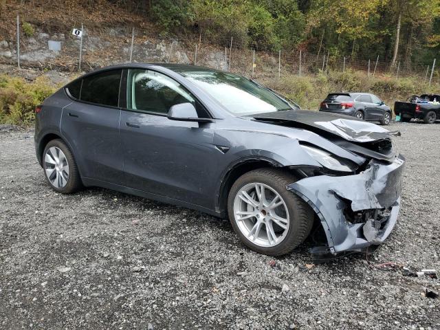 Photo 4 from auction – 2023 TESLA MODEL Y with VIN 7SAYGDED3PF932757