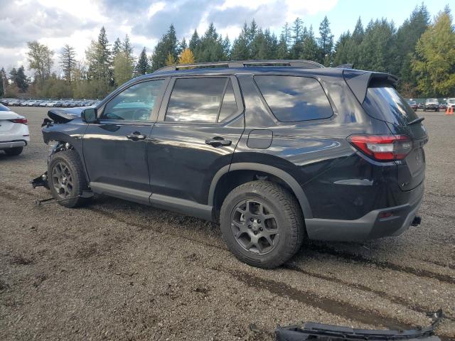 Photo 2 from auction – 2024 HONDA PILOT TRAI with VIN 5FNYG1H64RB026581