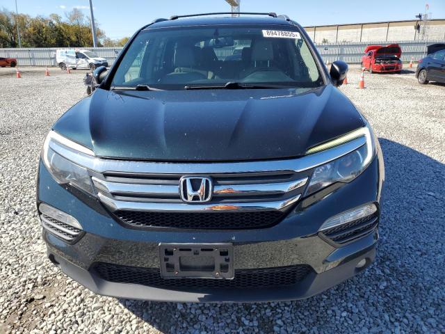 Photo 5 from auction – 2016 HONDA PILOT EXL with VIN 5FNYF6H86GB088613