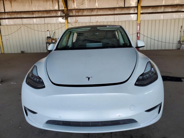 Photo 5 from auction – 2022 TESLA MODEL Y with VIN 7SAYGDEE6NF460236