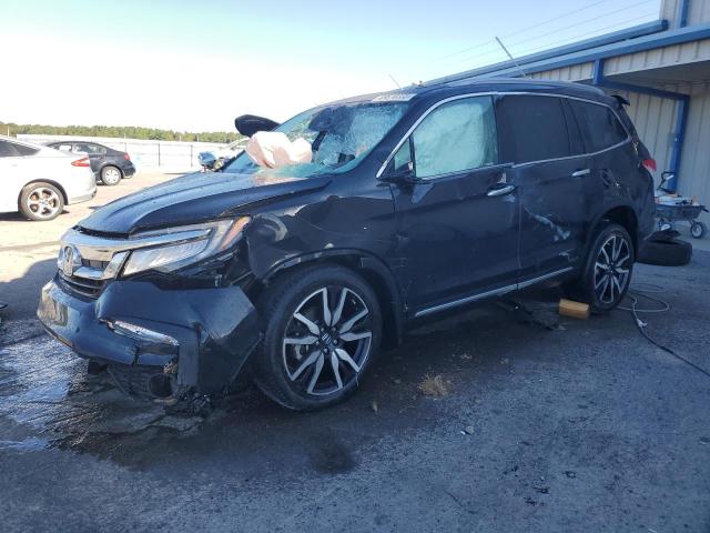 HONDA PILOT TOUR 2019 with VIN 5FNYF6H64KB074670 - Photo from auction