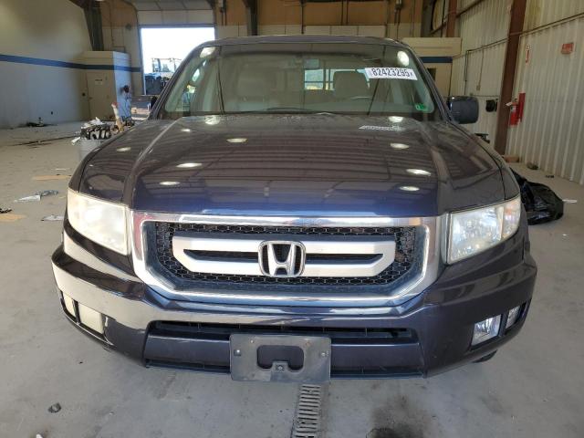 Photo 5 from auction – 2011 HONDA RIDGELINE with VIN 5FPYK1F54BB009365