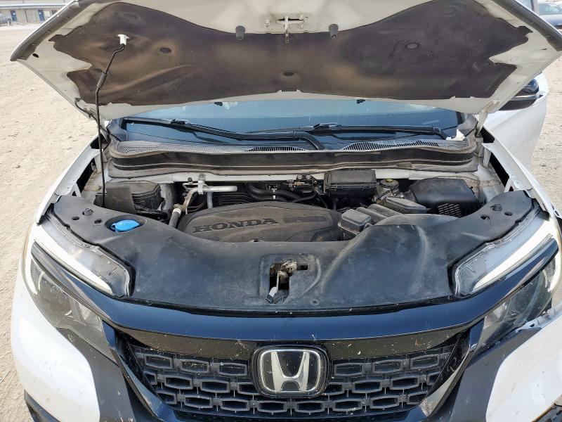 Photo 12 from auction – 2020 HONDA PASSPORT E with VIN 5FNYF7H50LB004226