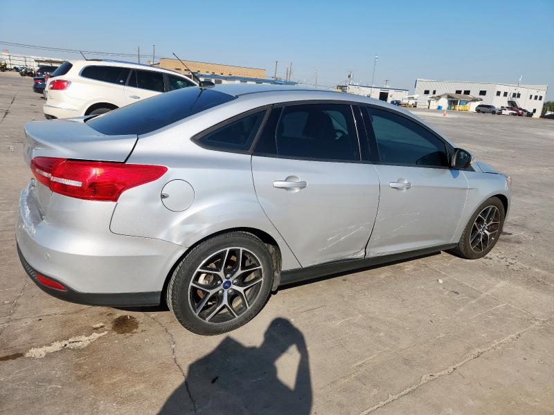 Photo 3 from auction – 2016 FORD FOCUS SE with VIN 1FADP3F20GL289029