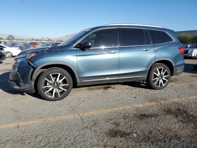 HONDA PILOT TOURING 2019 with VIN 5FNYF5H67KB043293 - Photo from auction