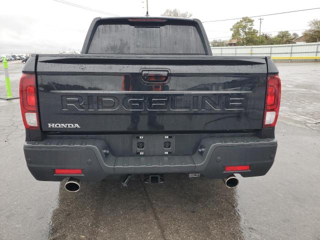Photo 6 from auction – 2024 HONDA RIDGELINE with VIN 5FPYK3F89RB019972