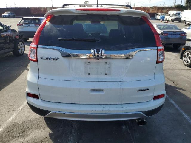 Photo 6 from auction – 2015 HONDA CR-V TOURI with VIN 5J6RM3H90FL008598