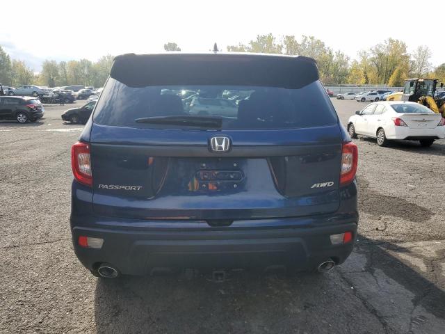 Photo 6 from auction – 2021 HONDA PASSPORT E with VIN 5FNYF8H52MB016126