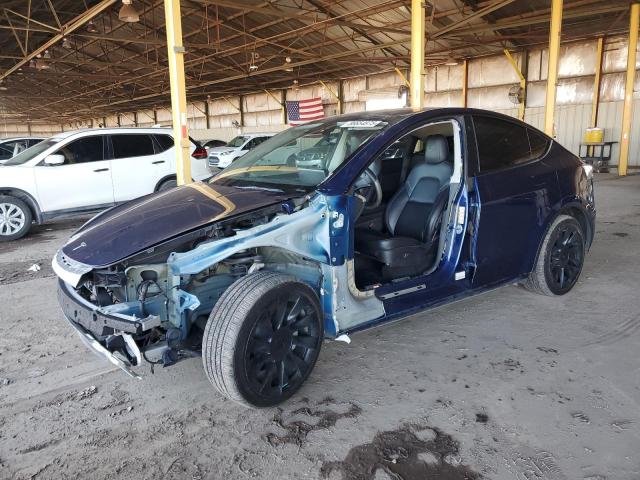 TESLA MODEL Y 2023 with VIN 7SAYGAEE2PF582870 - Photo from auction