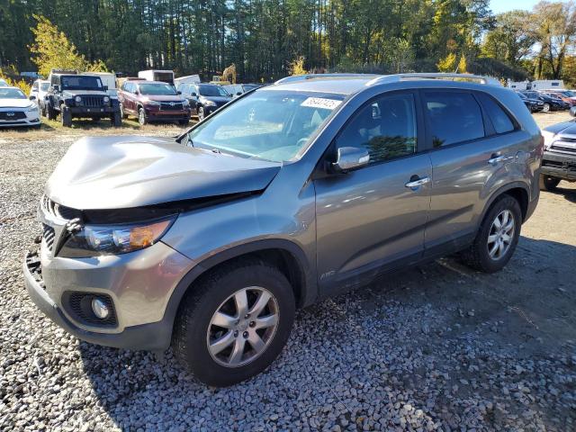 KIA SORENTO LX 2013 with VIN 5XYKTDA64DG387579 - Photo from auction