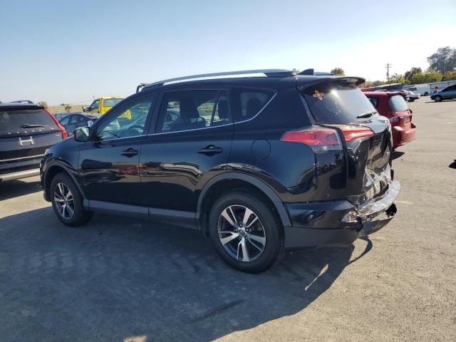 Photo 2 from auction – 2016 TOYOTA RAV4 XLE with VIN 2T3WFREV4GW258836