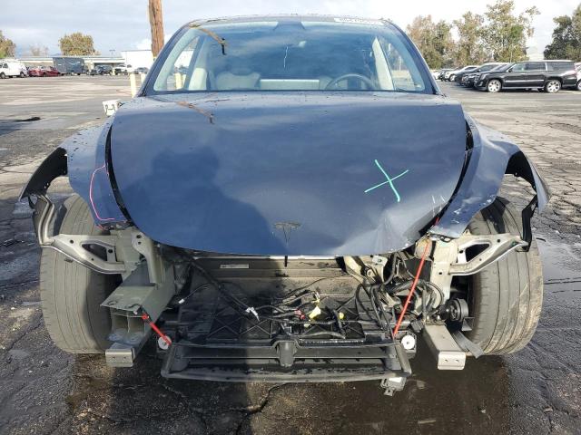 Photo 5 from auction – 2022 TESLA MODEL Y with VIN 7SAYGAEE2NF567797