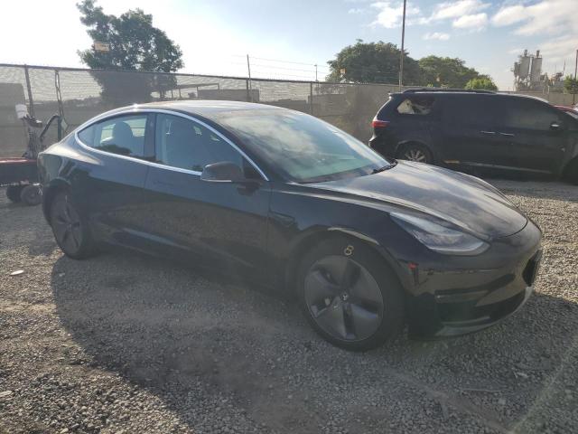 Photo 4 from auction – 2019 TESLA MODEL 3 with VIN 5YJ3E1EA6KF415723