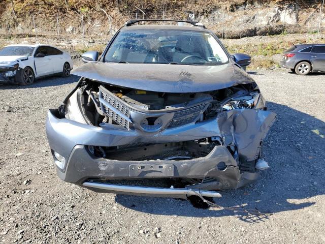 Photo 5 from auction – 2014 TOYOTA RAV4 XLE with VIN JTMRFREV1ED067334