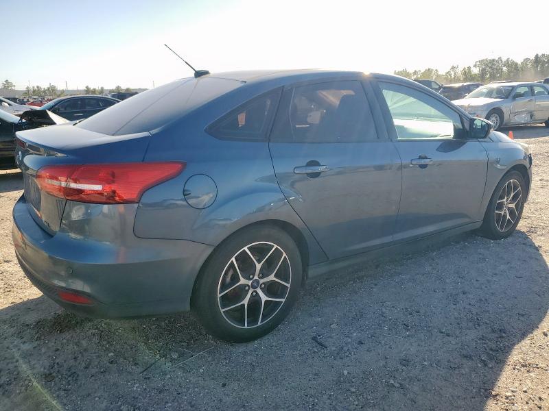Photo 3 from auction – 2018 FORD FOCUS SEL with VIN 1FADP3H20JL311888