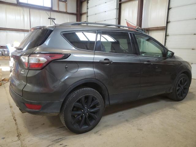 Photo 3 from auction – 2018 FORD ESCAPE SE with VIN 1FMCU9GD5JUB32594