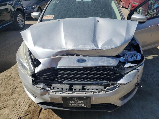 Photo 11 from auction – 2017 FORD FOCUS SE with VIN 1FADP3F20HL329711