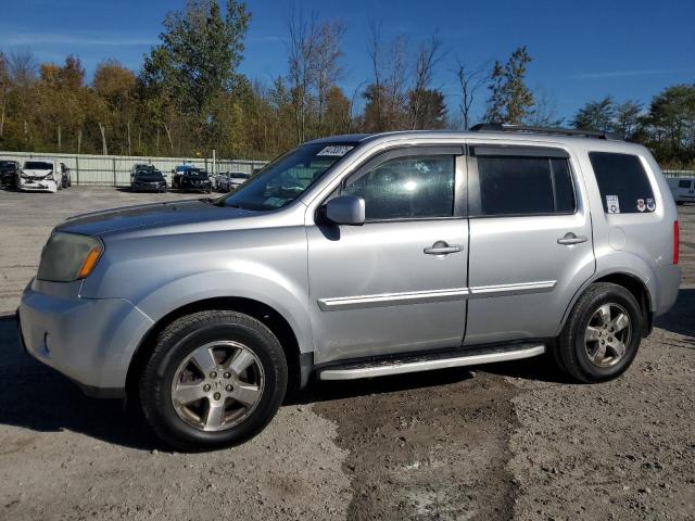 HONDA PILOT EXL 2011 with VIN 5FNYF4H5XBB011830 - Photo from auction