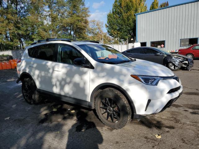 Photo 4 from auction – 2018 TOYOTA RAV4 LE with VIN 2T3BFREV9JW724928