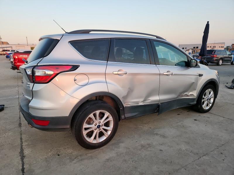 Photo 3 from auction – 2018 FORD ESCAPE SE with VIN 1FMCU9GD0JUB93710