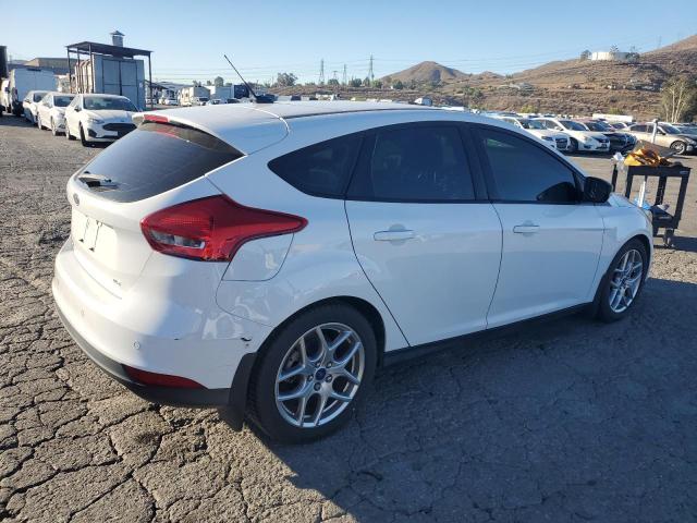 Photo 3 from auction – 2015 FORD FOCUS SE with VIN 1FADP3K23FL358297