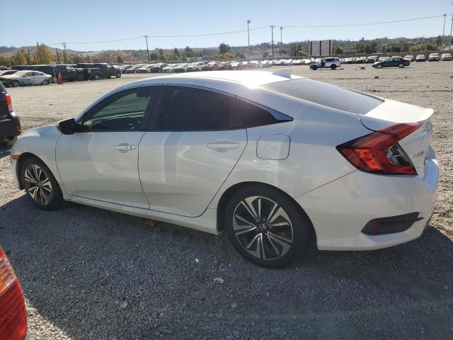 Photo 2 from auction – 2018 HONDA CIVIC EX with VIN JHMFC1F34JX035995