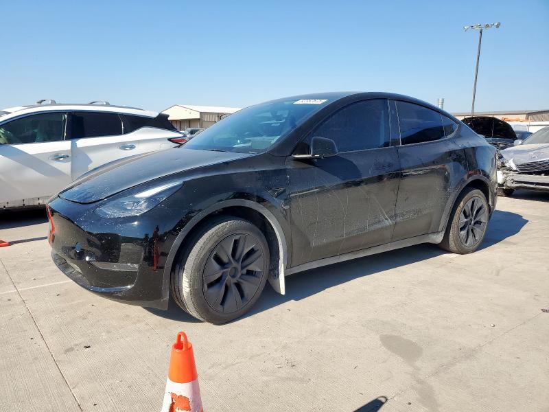 TESLA MODEL Y 2024 with VIN 7SAYGDEE1RA302874 - Photo from auction