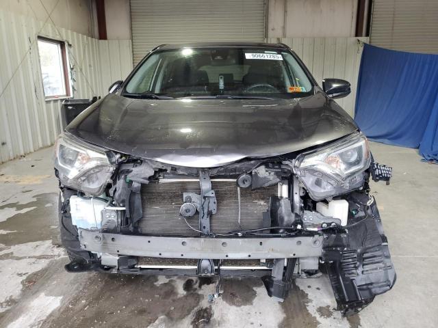 Photo 5 from auction – 2017 TOYOTA RAV4 LE with VIN JTMBFREV6HJ715094