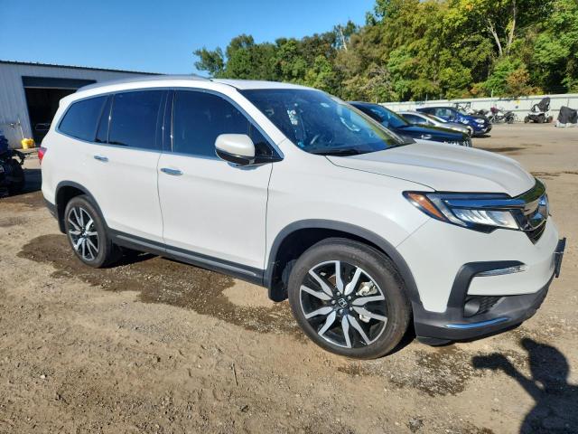 Photo 4 from auction – 2022 HONDA PILOT TOUR with VIN 5FNYF5H66NB034850