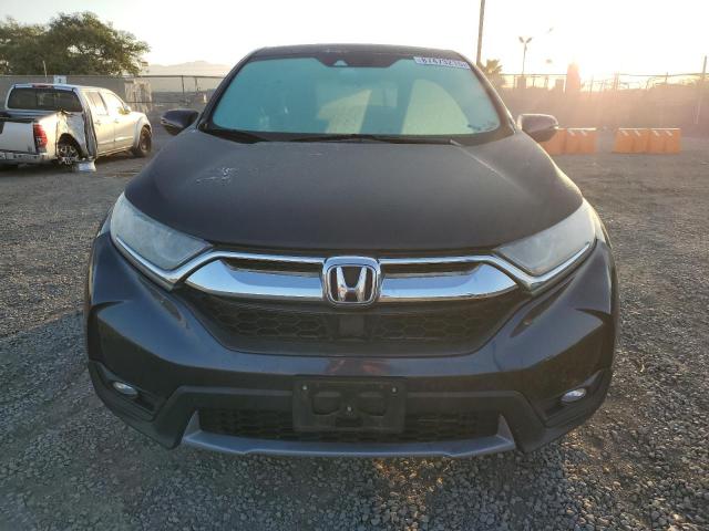 Photo 5 from auction – 2017 HONDA CR-V EX with VIN 7FARW1H54HE029014
